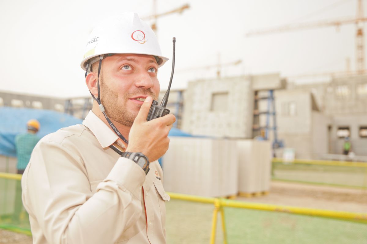 Foreman coordinating phased renovation work on site
